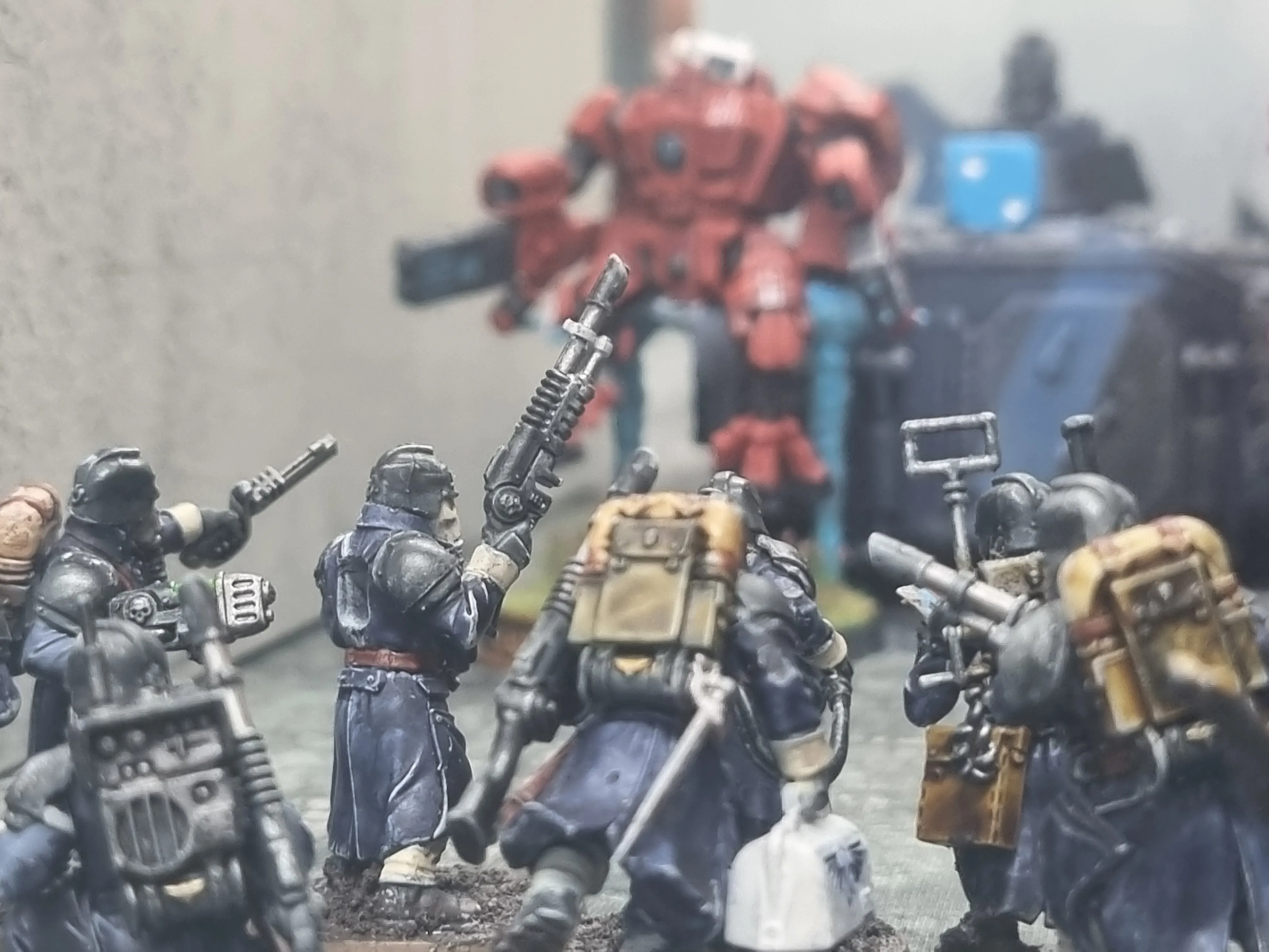 Krieg infantry face a Sunforge battlesuit