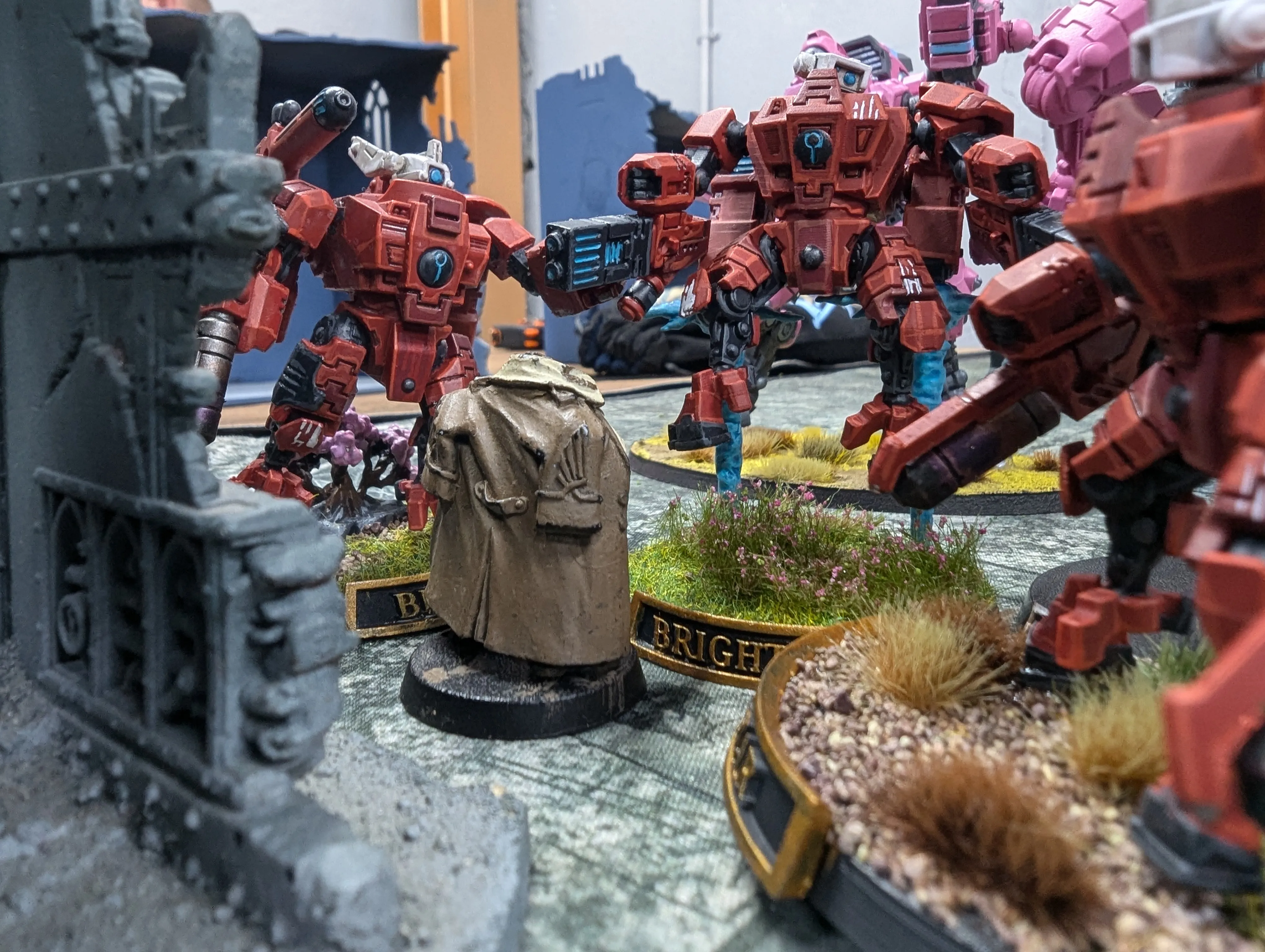 Guard commander in melee with crisis suits